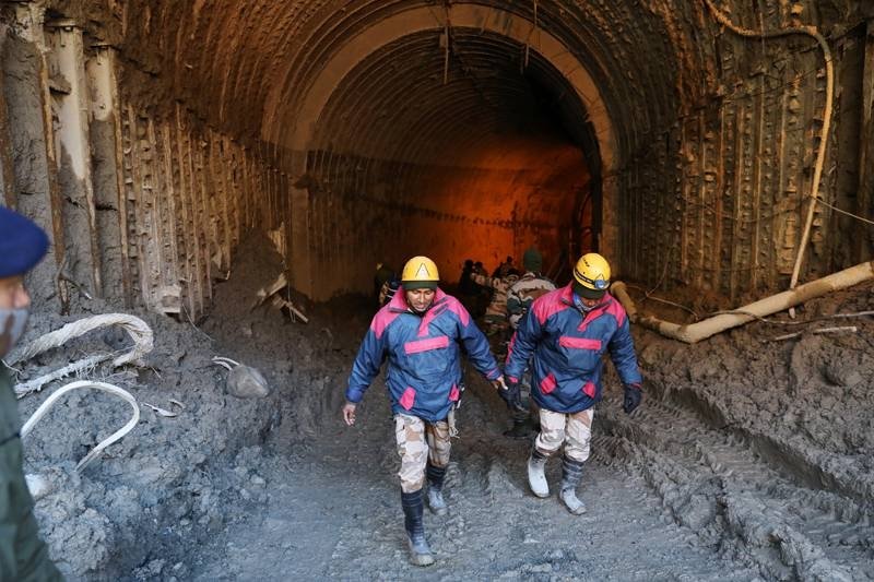 Nepal Rescuers Rush to Save Workers Trapped in Muddy Tunnel